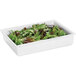 A white GET Bugambilia 1/2 size food pan filled with green leaves.