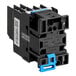 An Estella AC contactor with blue and black connectors.