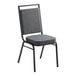 A Lancaster Table & Seating gray fabric banquet chair with black frame.