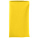 A folded yellow Intedge polycotton napkin.