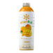 A plastic bottle of Smartfruit Mellow Mango Puree Beverage Mix with a white label.