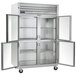 A Traulsen 2 section reach-in refrigerator with glass half doors.