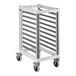 A white and grey metal Cambro tray cart with wheels.