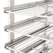 A Town rack with metal bars and shelves.