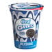 A container of f'real Oreo milkshake with a white lid.