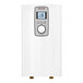A white rectangular Stiebel Eltron tankless water heater with buttons and a dial.