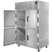 A silver Delfield reach-in freezer with two white half doors with black handles.