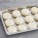 A tray of Pillsbury Southern Style preformed biscuit dough.