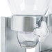 A Zevro silver double dry food dispenser with white lids.