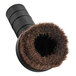 A black circular Lavex dusting brush with brown bristles.