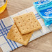 A close-up of Kellogg's Original Grahams crackers on a napkin.