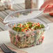 A Stalk Market rectangular clear plastic deli container with broccoli, salad, and food in it.