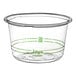 A clear plastic container with green text.
