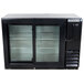 A Beverage-Air black underbar height back bar refrigerator with sliding glass doors.