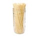 A jar filled with long thin wheat straws.