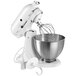 A white KitchenAid tilt head countertop mixer with a bowl and a whisk.