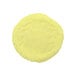 A yellow round object with white texture.