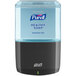 A Purell® graphite gray automatic soap dispenser with a black and grey label on a bottle of blue Purell® healthy soap.