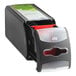 A black Tork countertop napkin dispenser with a clear plastic lid.
