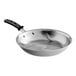 A Vollrath stainless steel frying pan with a black silicone handle.