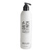 A white bottle of Grey + Finch DoveLok Crisp Air Shampoo with black text and a black lid.