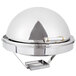 A silver Vollrath round chafer with brass accents on a metal stand.