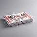 A white corrugated pizza box with red and black graphics on it.