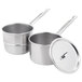 A Vollrath stainless steel double boiler set with two pots and lids.