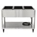 A stainless steel Vollrath hot food table with three sealed wells.