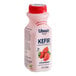 A pink plastic bottle of Lifeway Low-Fat Strawberry Kefir with a label.