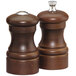 A close-up of a wooden Chef Specialties salt and pepper mill with a matching salt shaker.