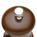 A Chef Specialties walnut pepper mill with a silver knob.