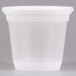 A Pactiv Newspring translucent plastic deli container with a lid.