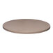 A close-up of a Perfect Tables 24" round concrete table top.
