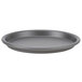 An American Metalcraft tapered aluminum pizza pan on a white surface.