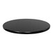 A black round Perfect Tables hammertone copper table top.