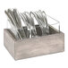 A Cal-Mil wooden flatware organizer with silverware inside.