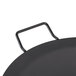 An American Metalcraft round wrought iron griddle with a handle.