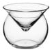 A clear Acopa martini glass with a curved bottom.