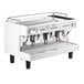 A white Gaggia Vetro espresso machine with three coffee machines.