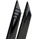 A close-up of a pair of black Fineline Tiny Temptations plastic tongs.