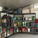 AR Shelving Garage Series boltless shelving unit in a garage with a variety of items on the shelves.