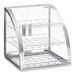 A stainless steel bakery display case with clear glass shelves and a clear glass top.