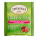 A green Twinings tea box with pomegranate and strawberry on the label.