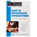 The Professional Bar & Beverage Operation book on a counter.