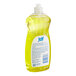 A yellow bottle of Joy lemon-scented dishwashing liquid on a counter.