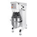 A white Varimixer V-Series floor mixer with a large round metal bowl.