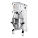 A Varimixer V100PL commercial mixer with a white and silver base and metal bowl.