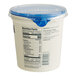 A Chobani Non-Fat Plain Greek Yogurt container with a blue lid.