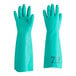 A pair of green Ansell AlphaTec Solvex rubber gloves.